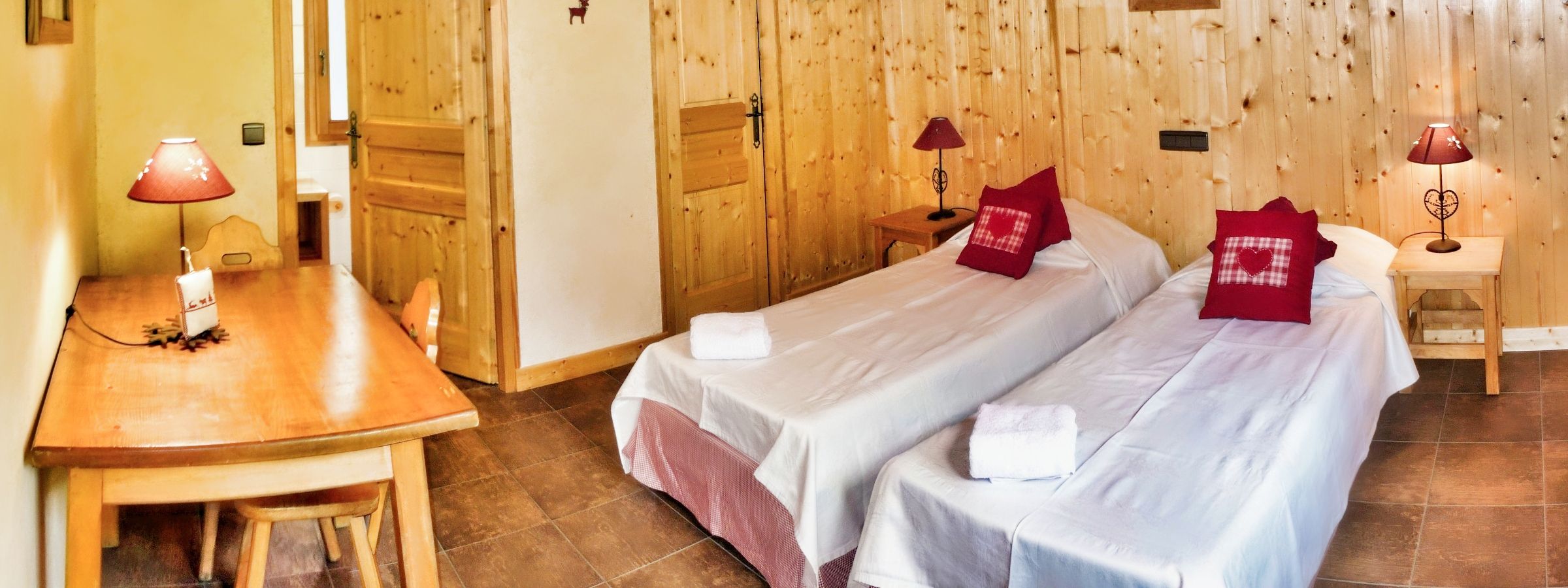 The bedrooms in Chalet Clovis are nicely decorated in a savoyard Style