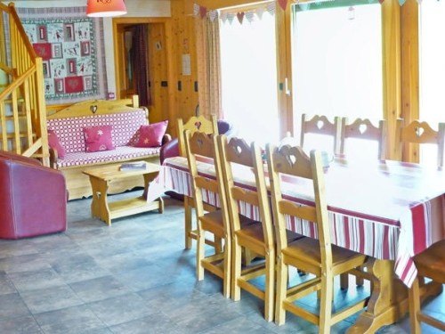 Lovely spacious dining room leading to a suntrapped terrace at Chalet Clovis in Morzine, Portes Du Soleil